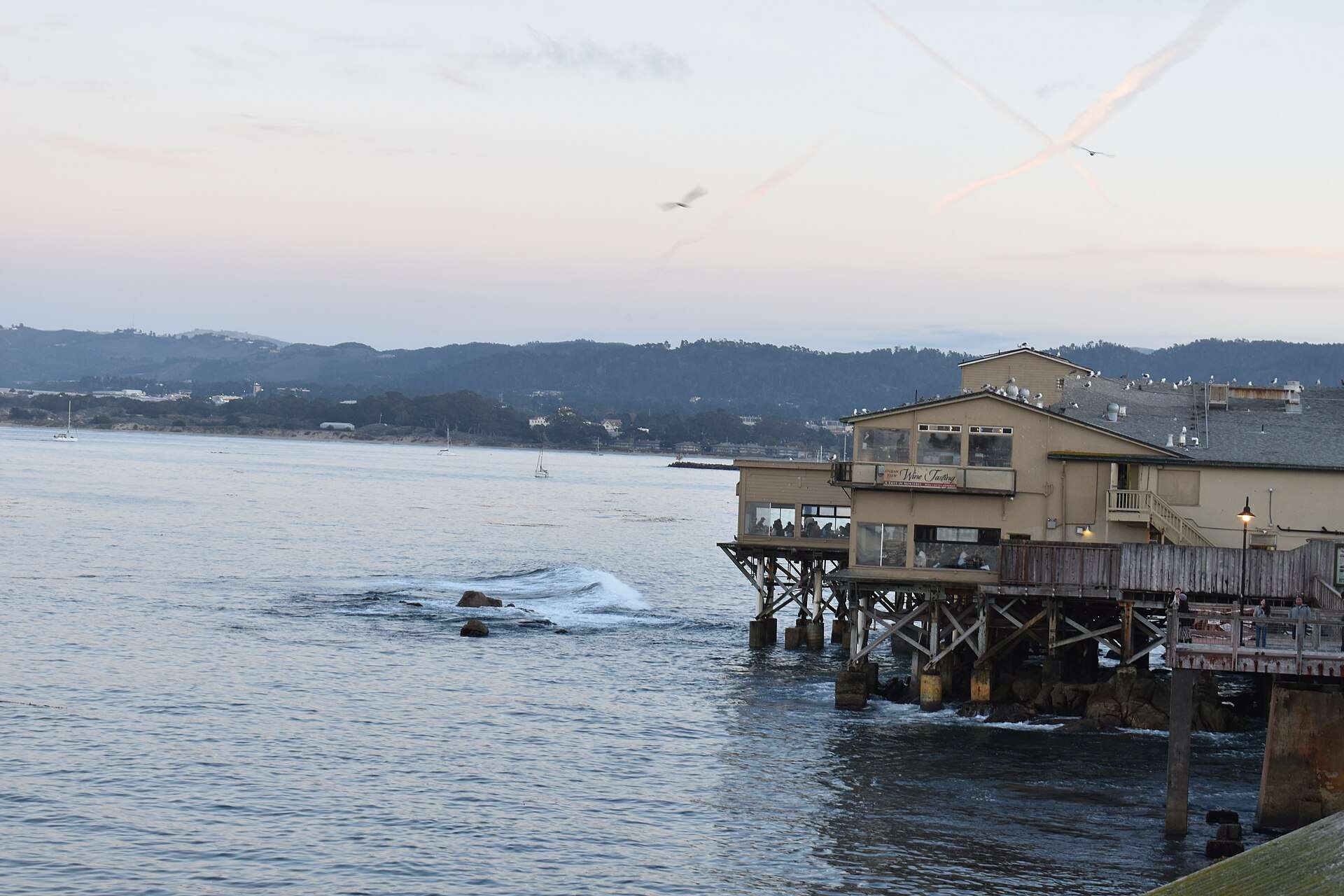 Cannery Row on its stilts over Monterey Bay