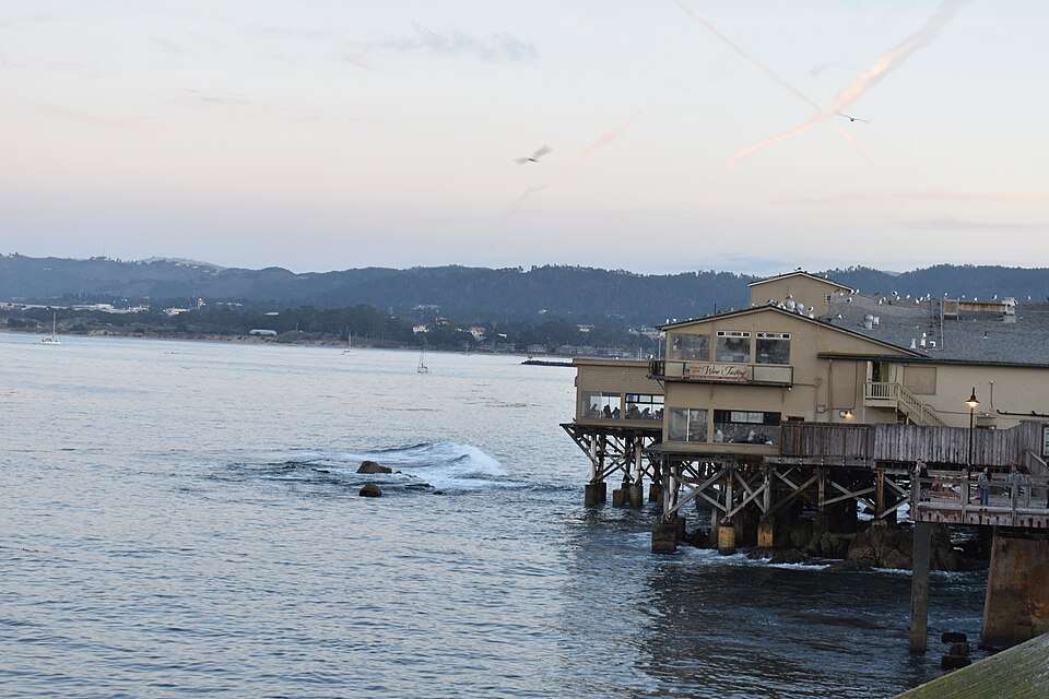 Cannery Row on its stilts over Monterey Bay