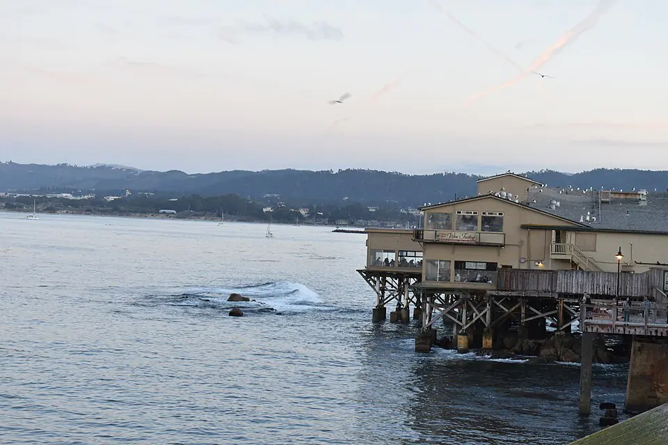 Cannery Row on its stilts over Monterey Bay